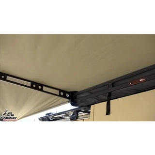 Close-up of a tent roof with a metal bracket and 'The Bush Company' logo.