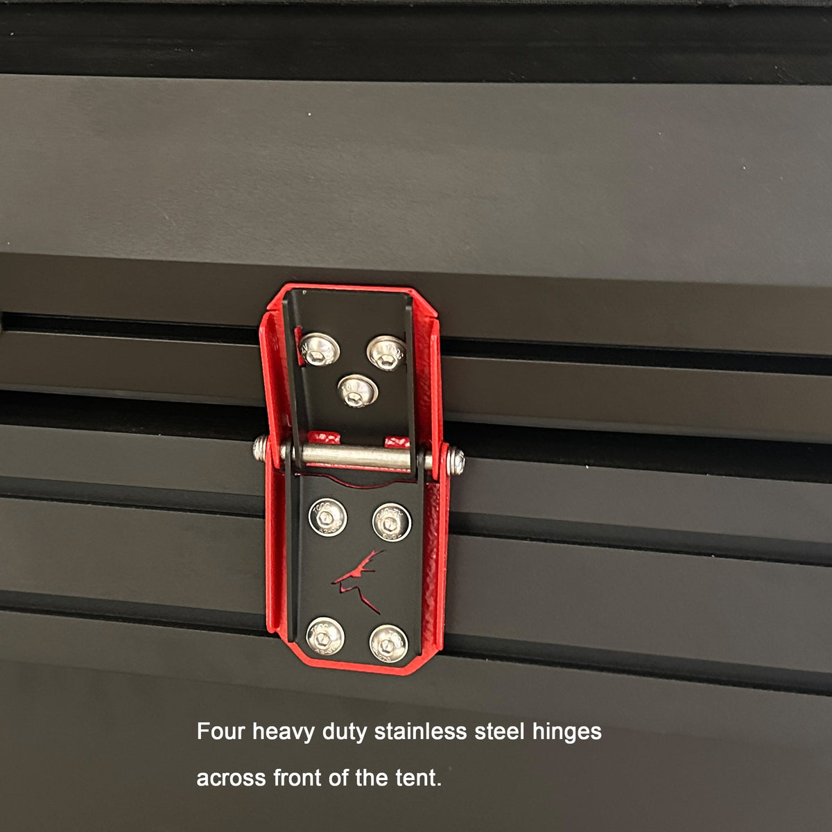 Bush Company AX27 heavy-duty stainless steel hinges on the aluminium shell