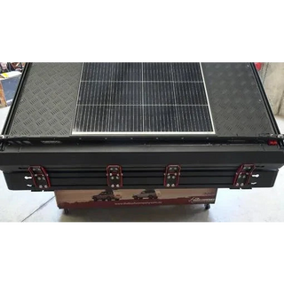 Solar panel on a black roof top tent