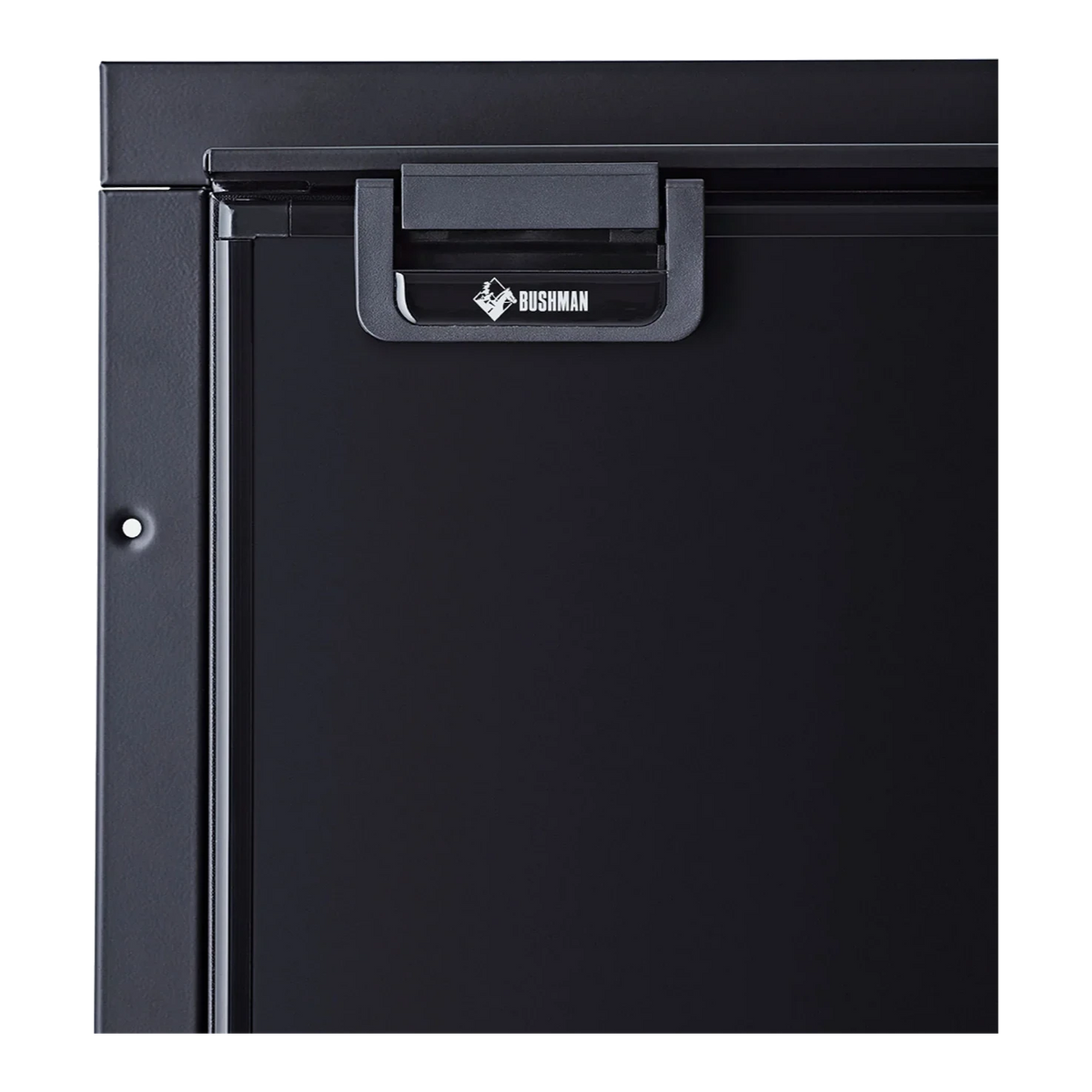 Close up of a Bushman DC-X series upright fridge top corner showing the recessed door handle with Bushman badge and mounting flange