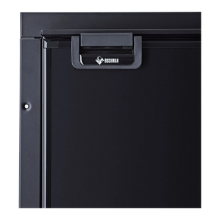 Close up of a Bushman DC-X series upright fridge top corner showing the recessed door handle with Bushman badge and mounting flange