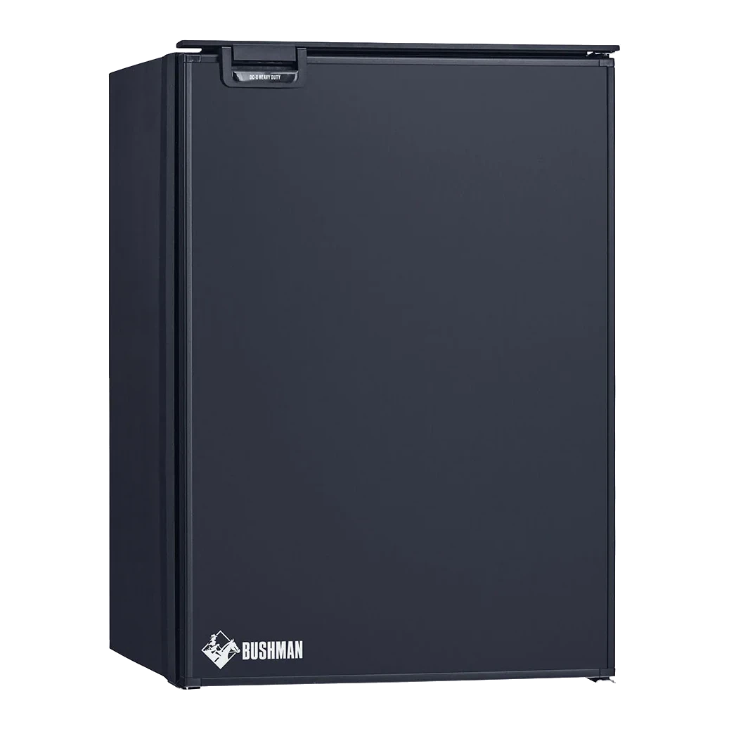 Bushman DC130-X upright fridge freezer with the door closed, showing the matte black front panel and Bushman badge