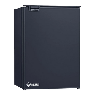 Bushman DC130-X upright fridge freezer with the door closed, showing the matte black front panel and Bushman badge