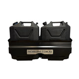 Two black fuel cans in a black Thorburns Dual Jerry Can Holder Accessory