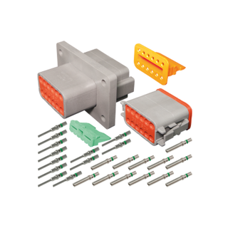 The 12-circuit Deutsch DT connector kit laid out: the grey flange-mount receptacle and matching plug with orange seals, a yellow wedge lock, a green wedge lock, and the full set of solid pins and sockets