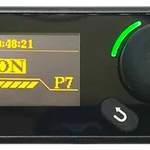 Black electronic device with digital display and control buttons on a black background