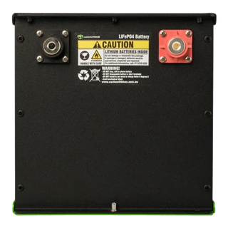 Rear face of a Custom Lithium LiFePO4 battery in a black aluminium enclosure, with a threaded negative terminal at the left, a red-shrouded positive at the right, and the caution label warning that lithium batteries are inside