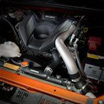 Car engine with Isuzu logo on a black background