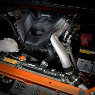 Car engine with Isuzu logo on a black background