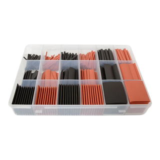 Heat shrink kit contents laid out, red and black tubes, assorted sizes