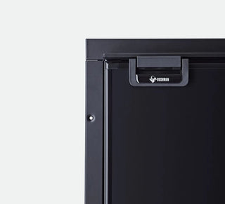 Close up of the Bushman DC130-X door handle and Bushman badge against the door seal and cabinet edge