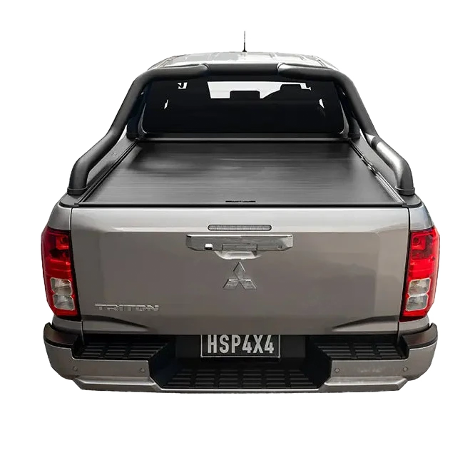 Back view of a silver Mitsubishi truck with a tonneau cover on a white background – HSP Electric Roller Cover Mitsubishi Triton MV