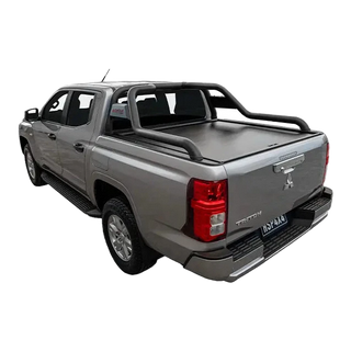 Gray pickup truck with a tonneau cover on a white background – HSP Electric Roller Cover Mitsubishi Triton MV
