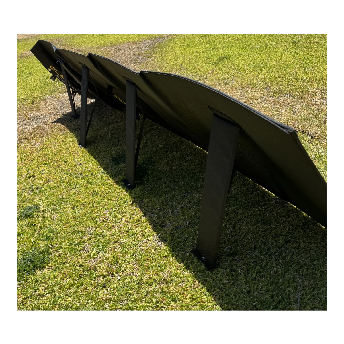 Foldable solar blanket laid out on grass – Elevate Automotive 200W 50V Solar Blanket – view 5