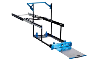 MSA drop slide with no fridge fitted, seen from above and behind with the sliding table extended, showing the drop-arm linkage, the four fridge stops on the tray and the blue front panel