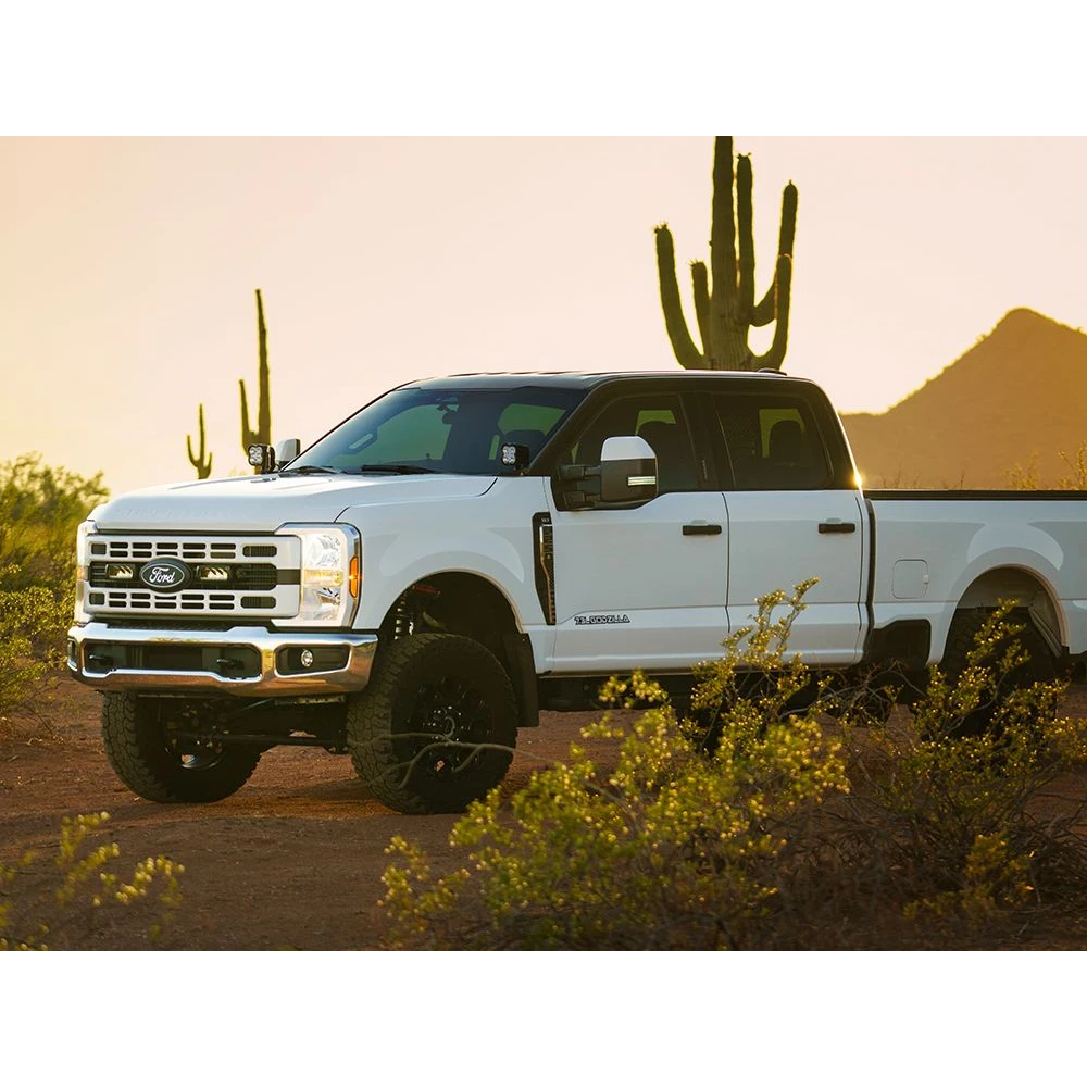 Ford F-250 & F-350 XL/XLT (2023+) Grille Kit – white Ford truck in a desert landscape with cacti