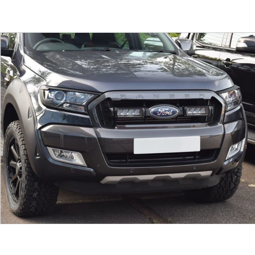 Front view of a Ford Ranger truck with Lazer Lamps Grille Kit (2016–2018) and clear background