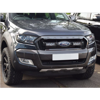 Front view of a Ford Ranger truck with Lazer Lamps Grille Kit (2016–2018) and clear background