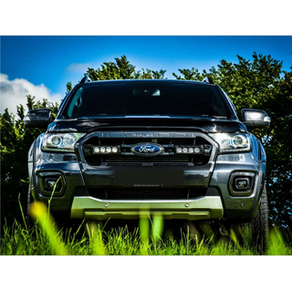 Ford Ranger with Lazer Lamps Grille Kit – Ford Ranger (2019–2022) in a grassy area with trees in the background