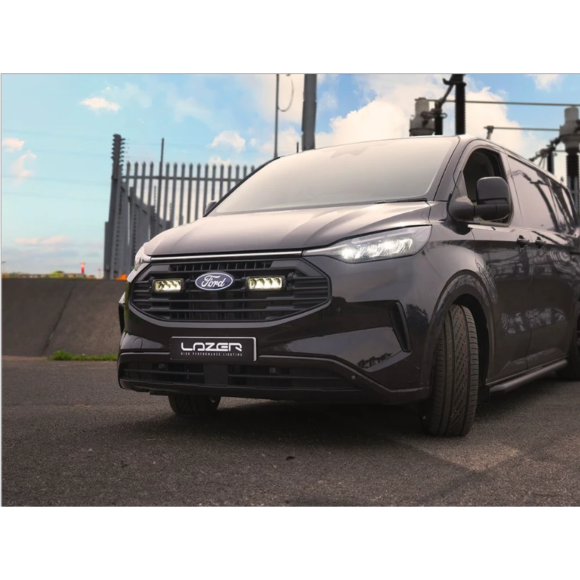 Ford van with Ford Transit Custom (2024+) Grille Kit on a road
