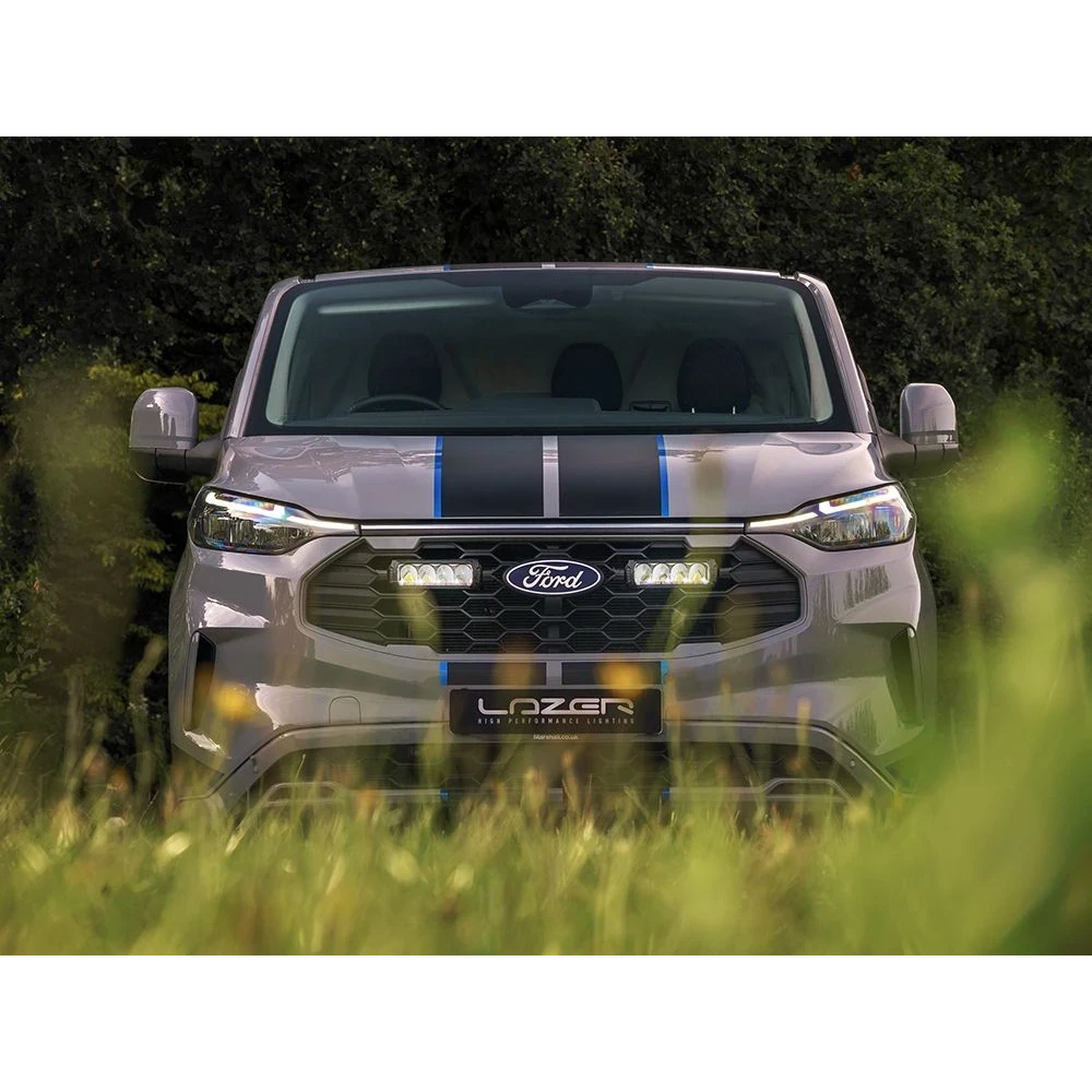 Ford vehicle with Lazer Lamps Grille Kit – Ford Transit Custom Sport (2024+) in a natural setting