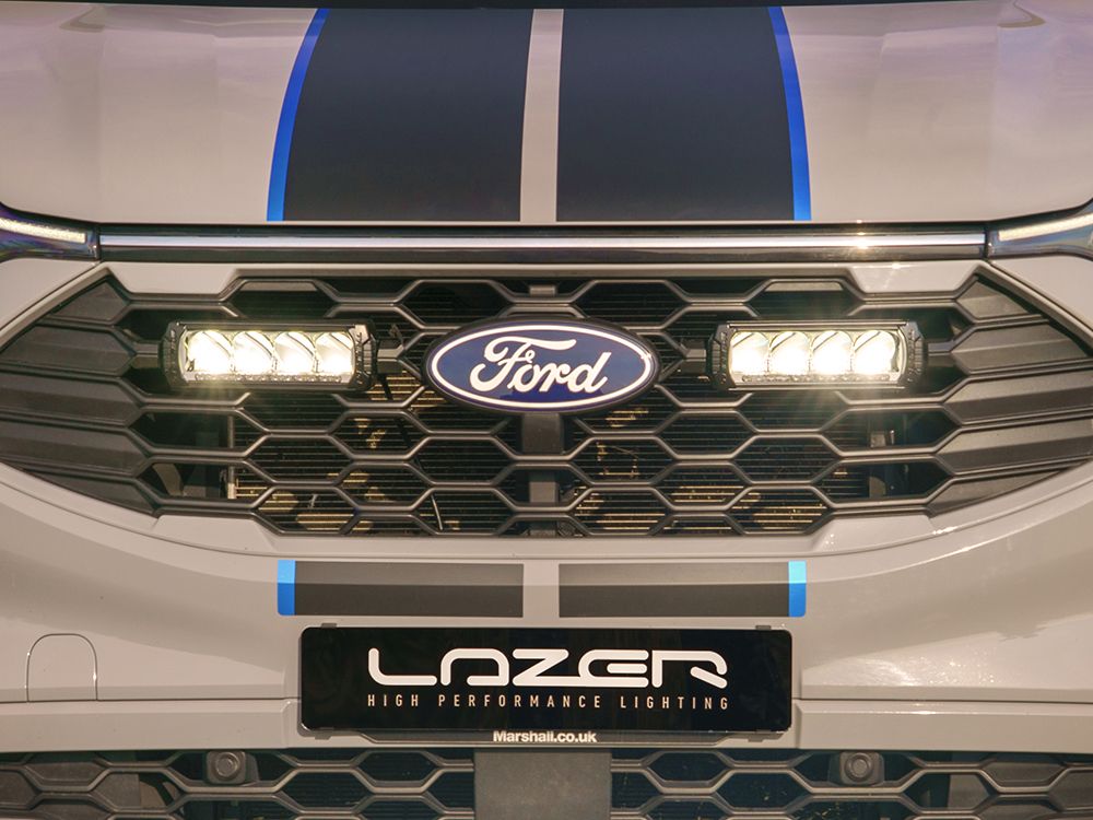 Ford vehicle grille with Lazer High Performance Lighting logo