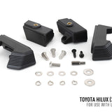 Black mechanical components and screws on a white background with Toyota Hilux 2021+ text.