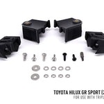 Black mechanical components and hardware on a white background with Toyota Hilux GR Sport text.