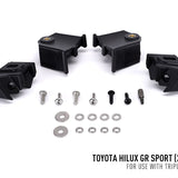 Black mechanical components and hardware on a white background with Toyota Hilux GR Sport text.