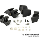 Black car roof rack components with screws and washers on a white background