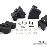 Set of black mechanical components and hardware on a white background