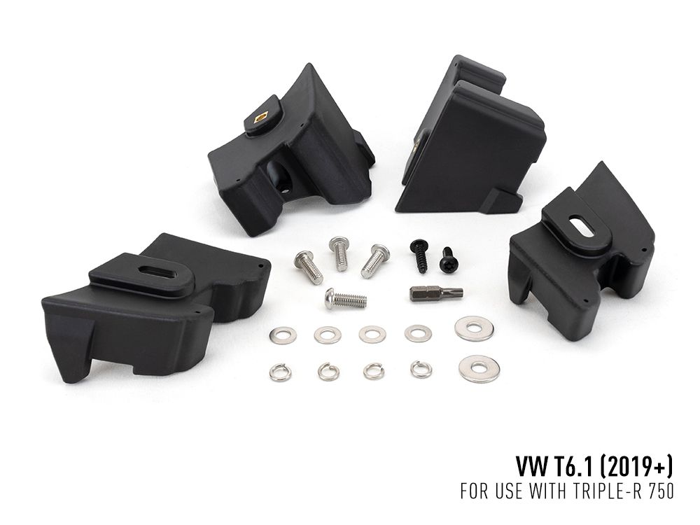 Set of black mechanical components and hardware on a white background