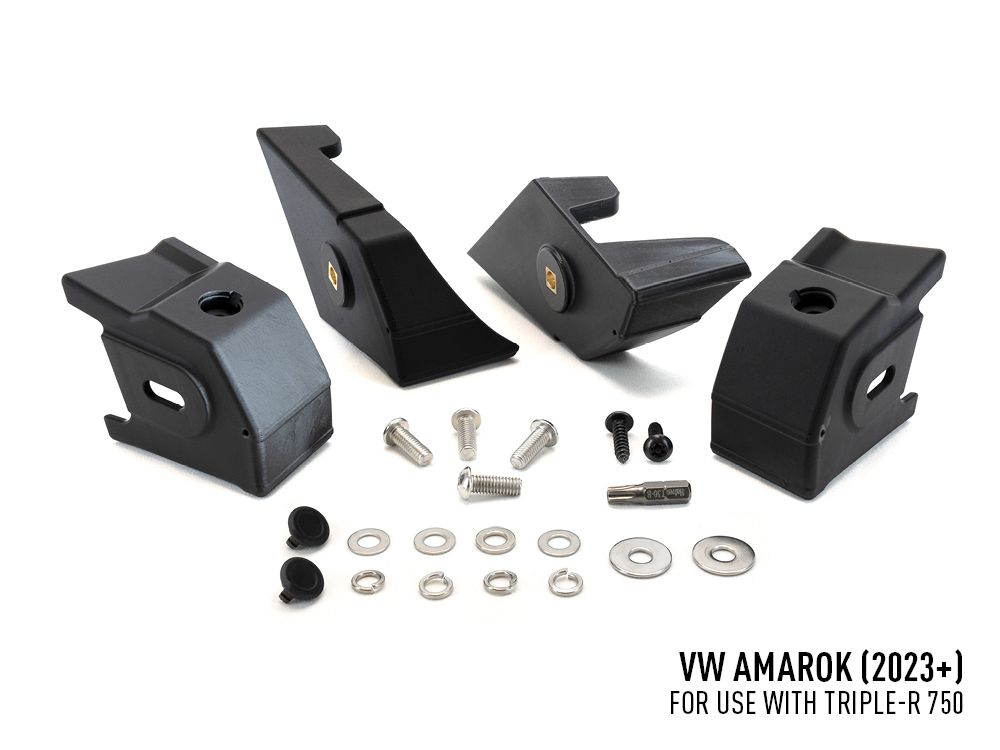 Set of black mechanical components with hardware on a white background, labeled for VW Amarok (2023+).