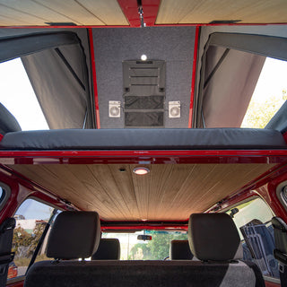 Raised Headspace roof showing timber paneling, lighting and built-in speakers