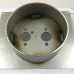 Metal component with circular holes on a white background