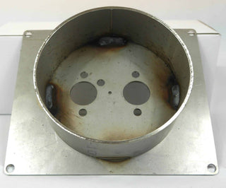 Metal component with circular holes on a white background