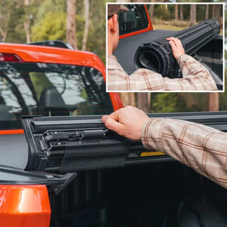 Person installing a black truck bed cover on an orange truck with a close-up inset showing the product – HSP Roll Mate Mitsubishi Triton MV