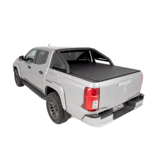 Gray pickup truck with a black tonneau cover on a white background – HSP Roll Mate Mitsubishi Triton MV