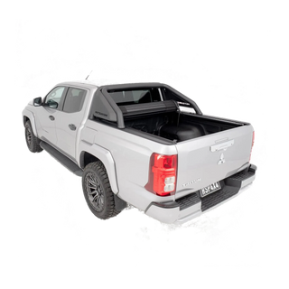 Silver Mitsubishi Triton pickup truck with a black tonneau cover on a white background