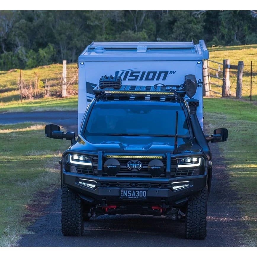 Black Toyota SUV with a Vision camper shell parked on a dirt road – LandCruiser 300 Series MSA POWER FOLD Towing Mirrors 07/2021-01/2025