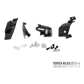 Lazer Lamps Grille Kit for Toyota Hilux (2017-2020) – set of black mechanical parts and screws on a white background with Toyota Hilux 2017+ text.
