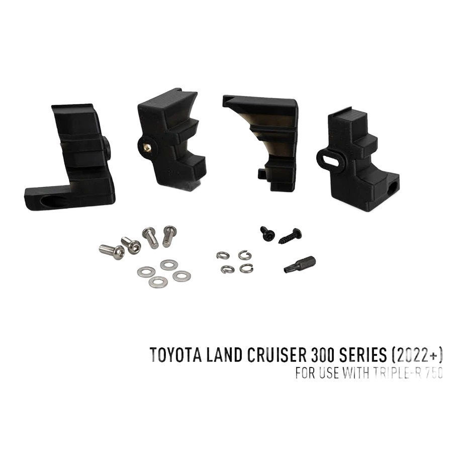 Lazer Lamps Grille Kit suitable for Toyota Land Cruiser 300 Series (2022+) – set of black mechanical components and hardware on a white background with Toyota Land Cruiser 300 Series text.