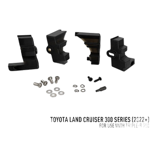 Lazer Lamps Grille Kit suitable for Toyota Land Cruiser 300 Series (2022+) – set of black mechanical components and hardware on a white background with Toyota Land Cruiser 300 Series text.