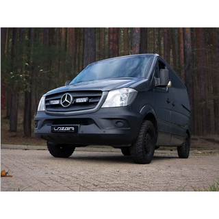 Black Mercedes-Benz van with 'Lozer' branding on a road with trees in the background with Lazer Lamps Mercedes Sprinter (2013-2017) Grille Kit