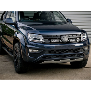 Front view of a black Volkswagen SUV parked on a concrete surface.