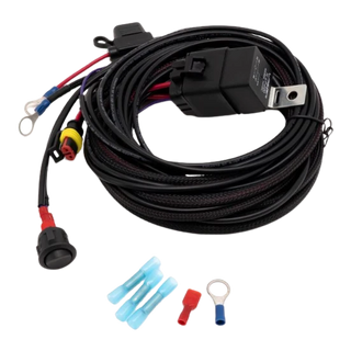 An assortment of Lazerlamps wiring kits including various connectors, cables, a relay, and fuses.