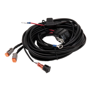 Coiled wiring harness with connectors on a white background