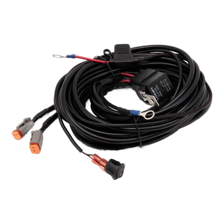 Coiled wiring harness with connectors on a white background