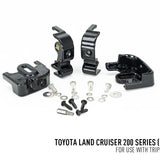 Set of black mechanical components with screws on a white background, labeled for Toyota Land Cruiser 200 Series.
