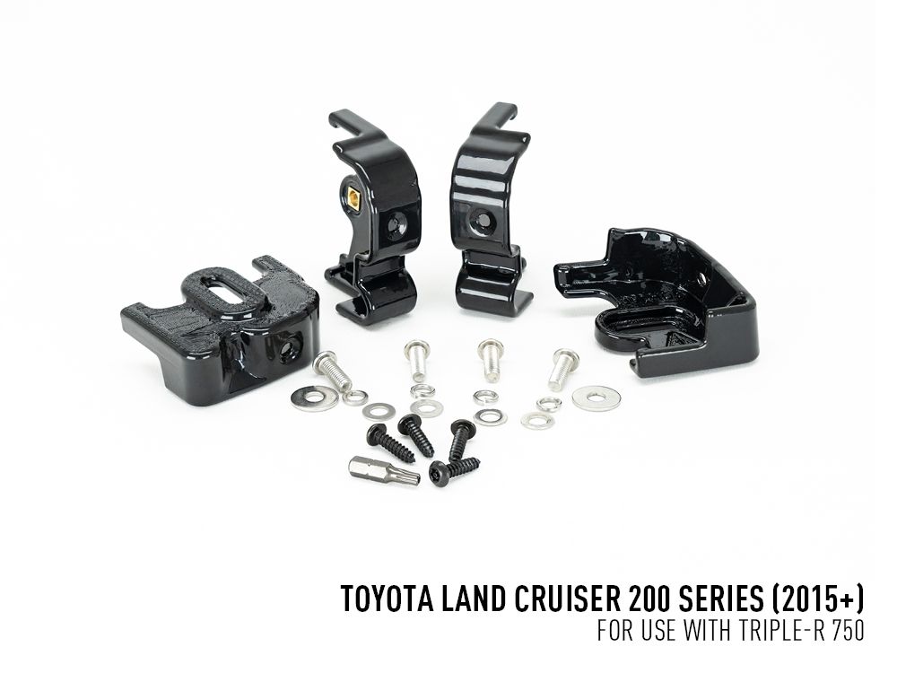 Set of black mechanical components with screws on a white background, labeled for Toyota Land Cruiser 200 Series.